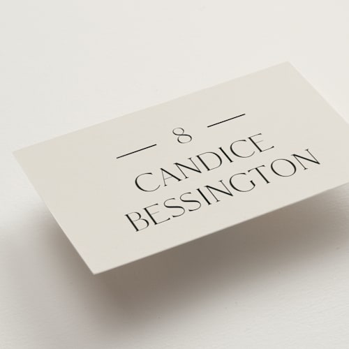 This is a linen wedding place cards with foil pressed by Baumbirdy called floral type arch printing on signature in placecard