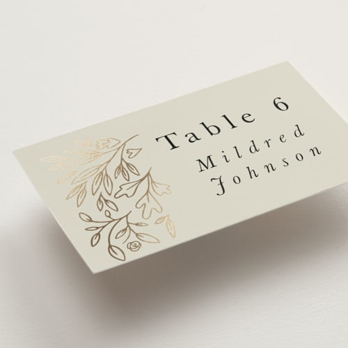 This is a taupe wedding place cards with foil pressed by Hannah Williams called foil botanical frame printing on signature in placecard