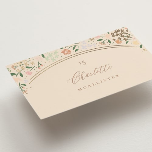 This is a ivory wedding place cards with foil pressed by Jennifer Wick called esther's garden printing on signature in placecard