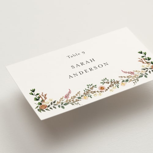 This is a blush wedding place cards with foil pressed by Susan Moyal called blooming vine printing on signature in placecard