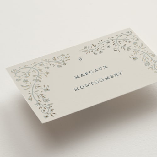 This is a something blue wedding place cards with foil pressed by Gwen Bedat called floral romance printing on signature in placecard