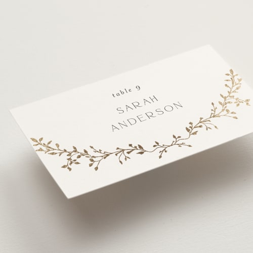 This is a alabaster wedding place cards with foil pressed by Susan Moyal called delicate vine printing on signature in placecard