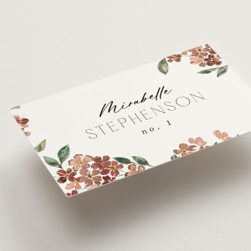 This is a dusty rose wedding place cards with foil pressed by Itsy Belle Studio called sweeping vine printing on signature in placecard