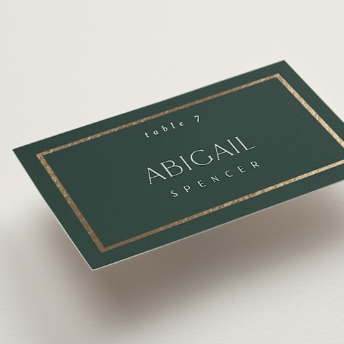 This is a evergreen wedding place cards with foil pressed by Nicole Walsh called regal printing on signature in placecard