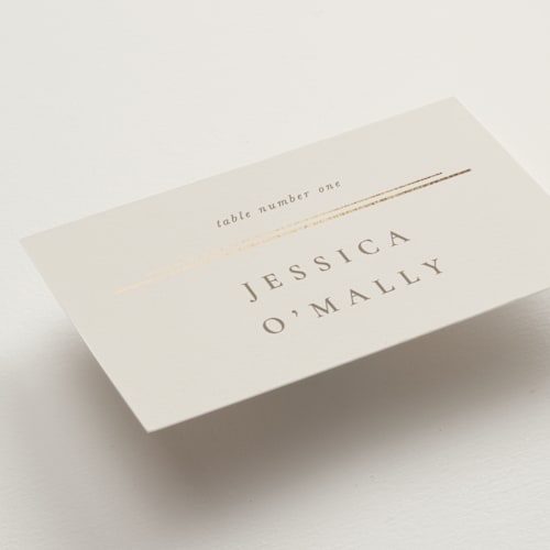 This is a sand wedding place cards with foil pressed by Jackie Mangiolino called illusion printing on signature in placecard