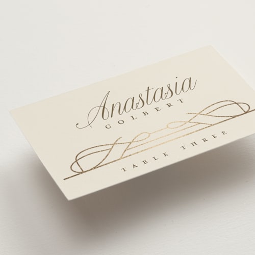 This is a cream wedding place cards with foil pressed by Katie Zimpel called simple art nouveau printing on signature in placecard