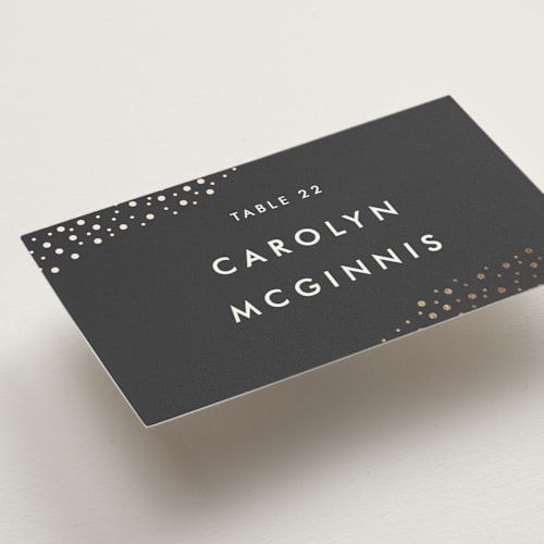 This is a soft black wedding place cards with foil pressed by Camille Robinson called modern glam printing on signature in placecard
