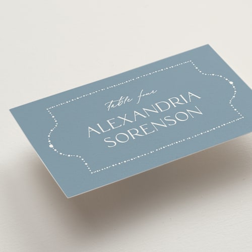 This is a delft blue wedding place cards with standard by Ashley DeMeyere called porcelain printing on signature in placecard
