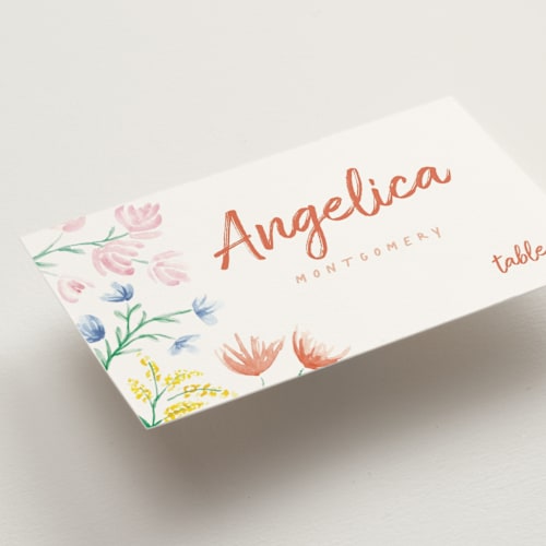 This is a peach wedding place cards with standard by Zani van Zyl called flora printing on signature in placecard