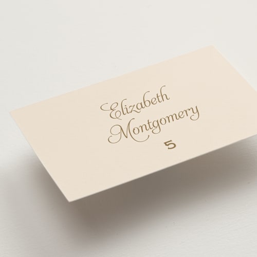 This is a champagne wedding place cards with standard by Carolyn MacLaren called modernne printing on signature in placecard