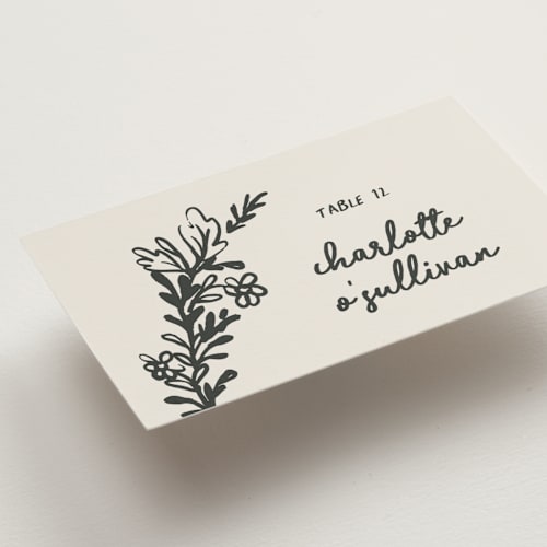 This is a ink wedding place cards with standard by Kelly Watkins called botanical crest printing on signature in placecard
