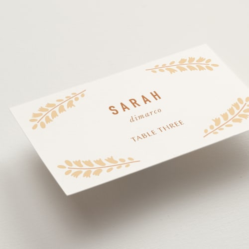 This is a peach wedding place cards with standard by Pippa Shaw called floral border printing on signature in placecard