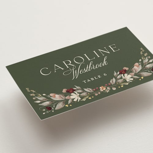 This is a vert wedding place cards with standard by Erin Deegan called fleur sauvage printing on signature in placecard