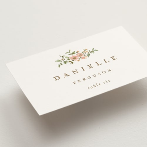 This is a blush wedding place cards with standard by Everett Paper Goods called foliage crest printing on signature in placecard