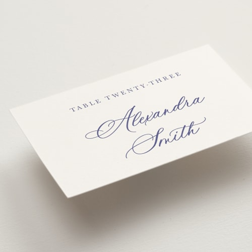This is a dusty blue wedding place cards with standard by Cass Loh called watercolor flowers crest printing on signature in placecard