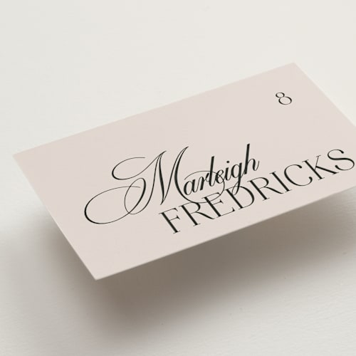 This is a ivory wedding place cards with standard by Melanie Kosuge called sibonie printing on signature in placecard