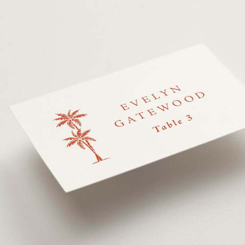 This is a persimmon wedding place cards with standard by Olivia Raufman called palm monogram printing on signature in placecard