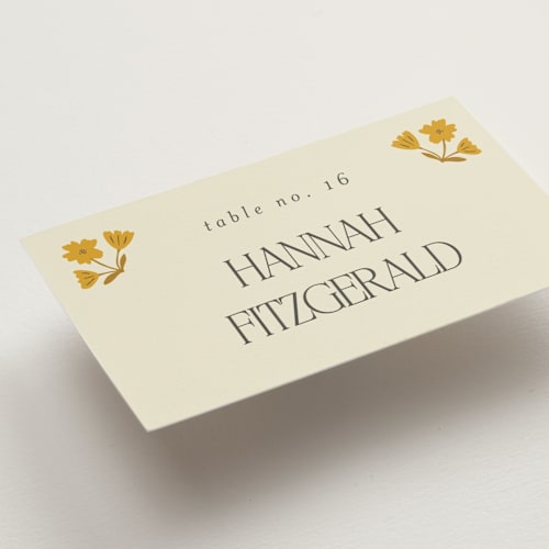 This is a yolk wedding place cards with standard by Morgan Kendall called vintage wildflowers printing on signature in placecard