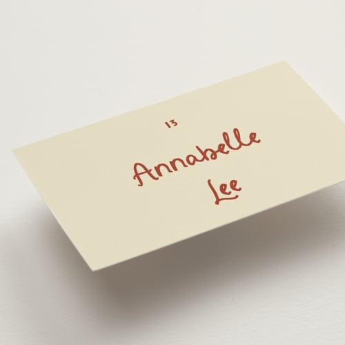 This is a rust wedding place cards with standard by Ani Somi called big heart wedding printing on signature in placecard