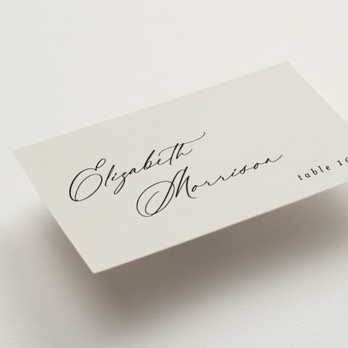 This is a ivory wedding place cards with standard by Carolyn Nicks called kinkaid printing on signature in placecard