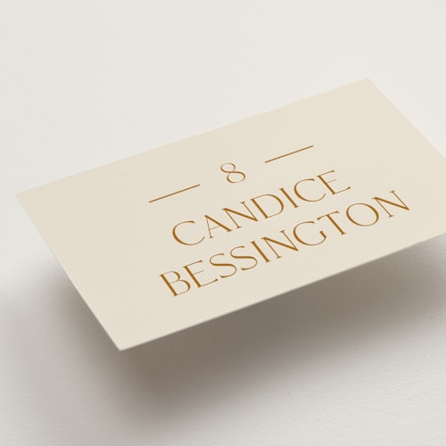 This is a cream wedding place cards with standard by Baumbirdy called floral type arch printing on signature in placecard