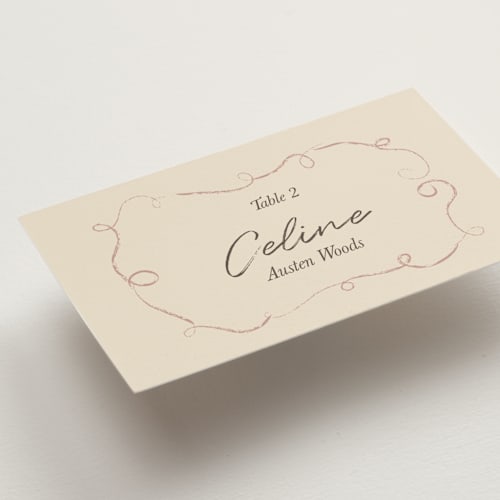 This is a buttercream wedding place cards with standard by Helena Vitto called the swan printing on signature in placecard