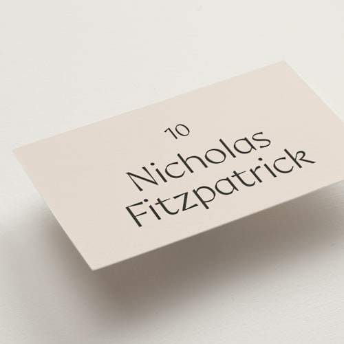 This is a ivory wedding place cards with standard by Melanie Kosuge called ayumi printing on signature in placecard