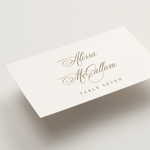 This is a champagne wedding place cards with standard by Jennifer Postorino called empire printing on signature in placecard