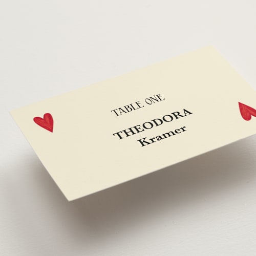 This is a champagne wedding place cards with standard by Helena Vitto called red hearts printing on signature in placecard
