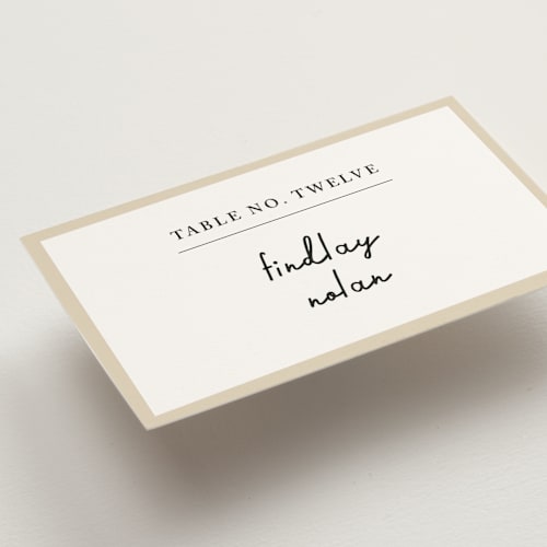 This is a champagne wedding place cards with standard by mo kelley called swirl frame printing on signature in placecard