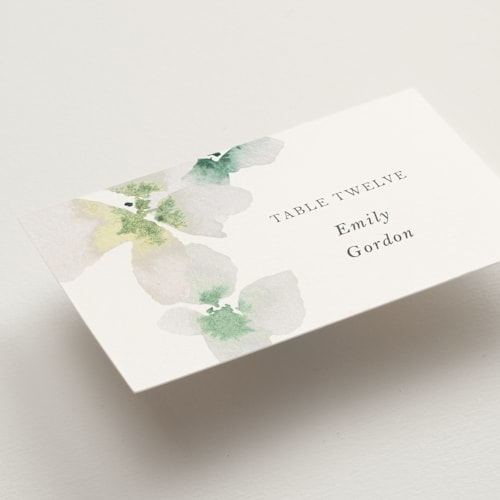 This is a springtime wedding place cards with standard by Design Lotus called whispered printing on signature in placecard