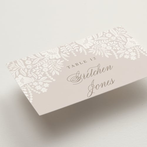 This is a cream wedding place cards with standard by Kristen Smith called lace trim printing on signature in placecard