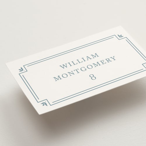 This is a french wedding place cards with standard by Carolyn MacLaren called fleur corner printing on signature in placecard