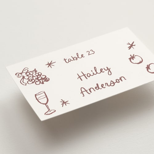This is a orchid dust wedding place cards with standard by Cass Loh called inky printing on signature in placecard