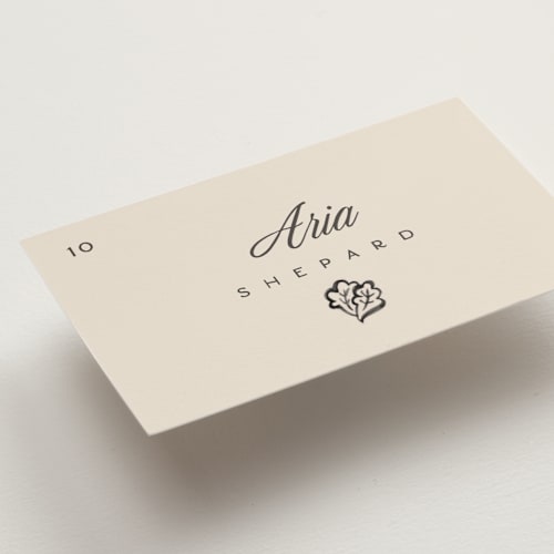 This is a coal wedding place cards with standard by Pixel and Hank called watercolor printing on signature in placecard