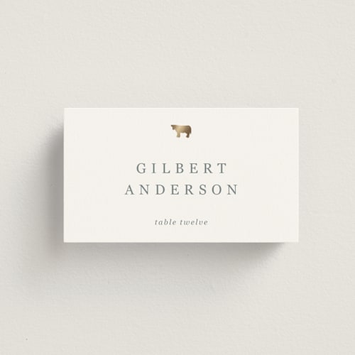 This is a ivory wedding place cards with foil pressed by Sierra Lee called noted printing on signature in placecard