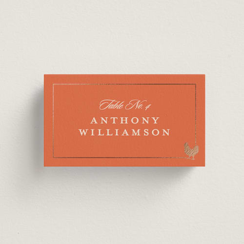 This is a mango wedding place cards with foil pressed by Stacy Maalouf called foil meal silhouettes printing on signature in placecard