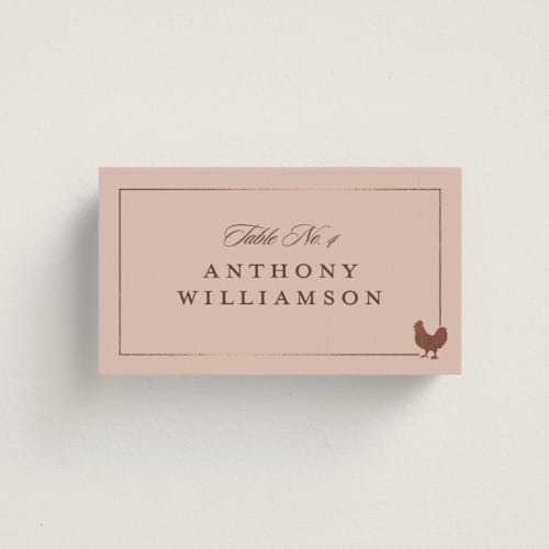 This is a salmon wedding place cards with foil pressed by Stacy Maalouf called foil meal silhouettes printing on signature in placecard