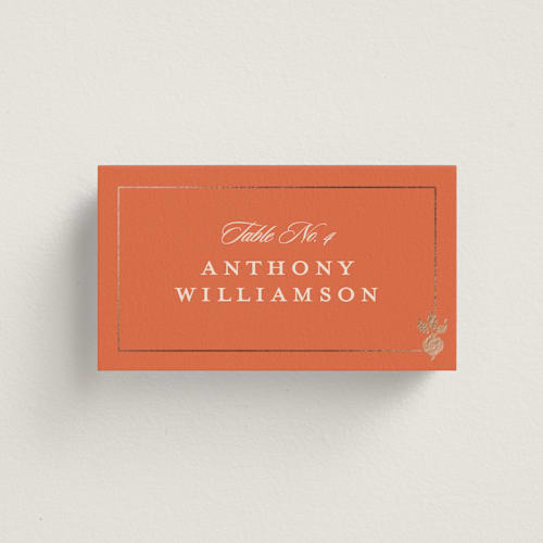This is a mango wedding place cards with foil pressed by Stacy Maalouf called foil meal silhouettes printing on signature in placecard