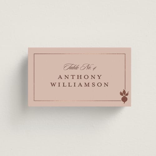 This is a salmon wedding place cards with foil pressed by Stacy Maalouf called foil meal silhouettes printing on signature in placecard