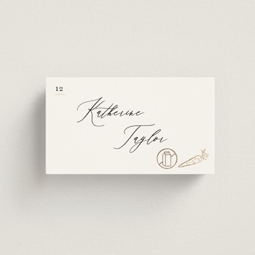 This is a ivory wedding place cards with foil pressed by Creo Study called gilded icons printing on signature in placecard