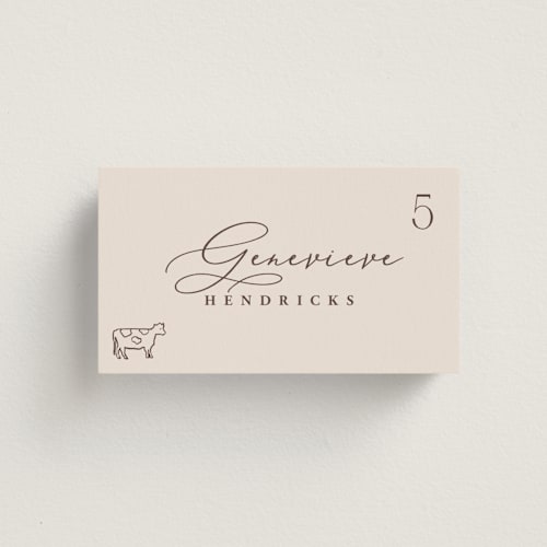 This is a ecru wedding place cards with standard by Hooray Creative called chic script printing on signature in placecard
