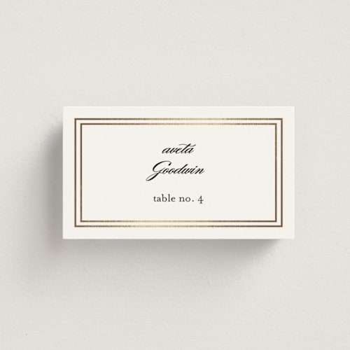 This is a snow wedding place cards with foil pressed by Kimberly FitzSimons called eloquence printing on signature in placecard