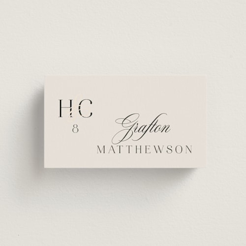 This is a ivory wedding place cards with foil pressed by Melanie Kosuge called honor printing on signature in placecard