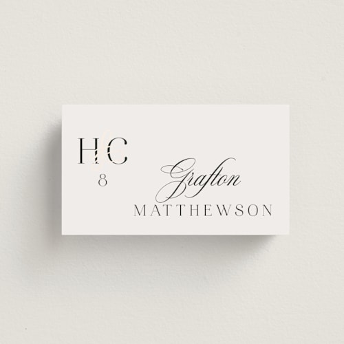 This is a ivory wedding place cards with foil pressed by Melanie Kosuge called honor printing on signature in placecard