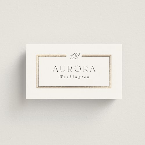 This is a pearl wedding place cards with foil pressed by Leah Bisch called elegant type printing on signature in placecard