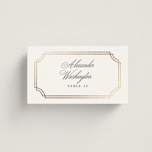 This is a porcelain wedding place cards with foil pressed by Sarah Brown called formally printing on signature in placecard