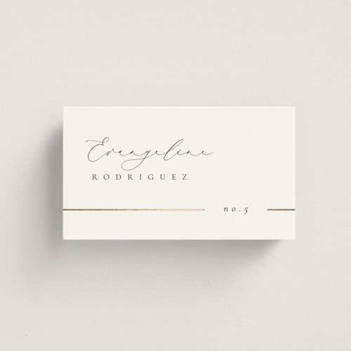 This is a classic wedding place cards with foil pressed by Kelly Schmidt called london printing on signature in placecard