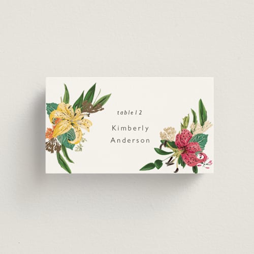 This is a tropical wedding place cards with foil pressed by Susan Moyal called delicate printing on signature in placecard
