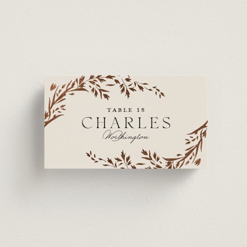 This is a almond wedding place cards with foil pressed by Erin L. Wilson called trailing vines printing on signature in placecard